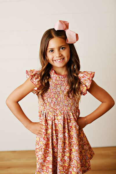 SMOCK FLUTTER DRESS